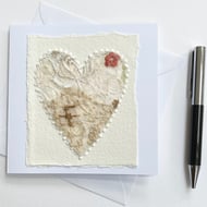 Up-cycled handmade fabric embroidered heart art card. 