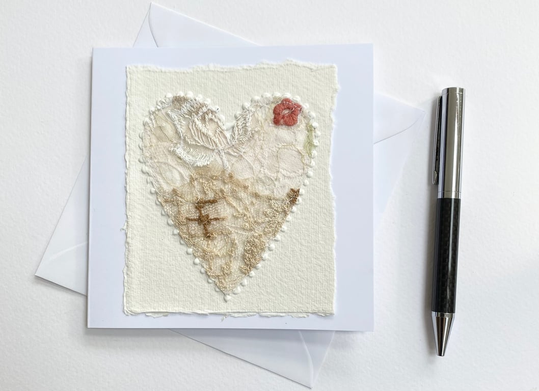 Up-cycled handmade fabric embroidered heart art card. 