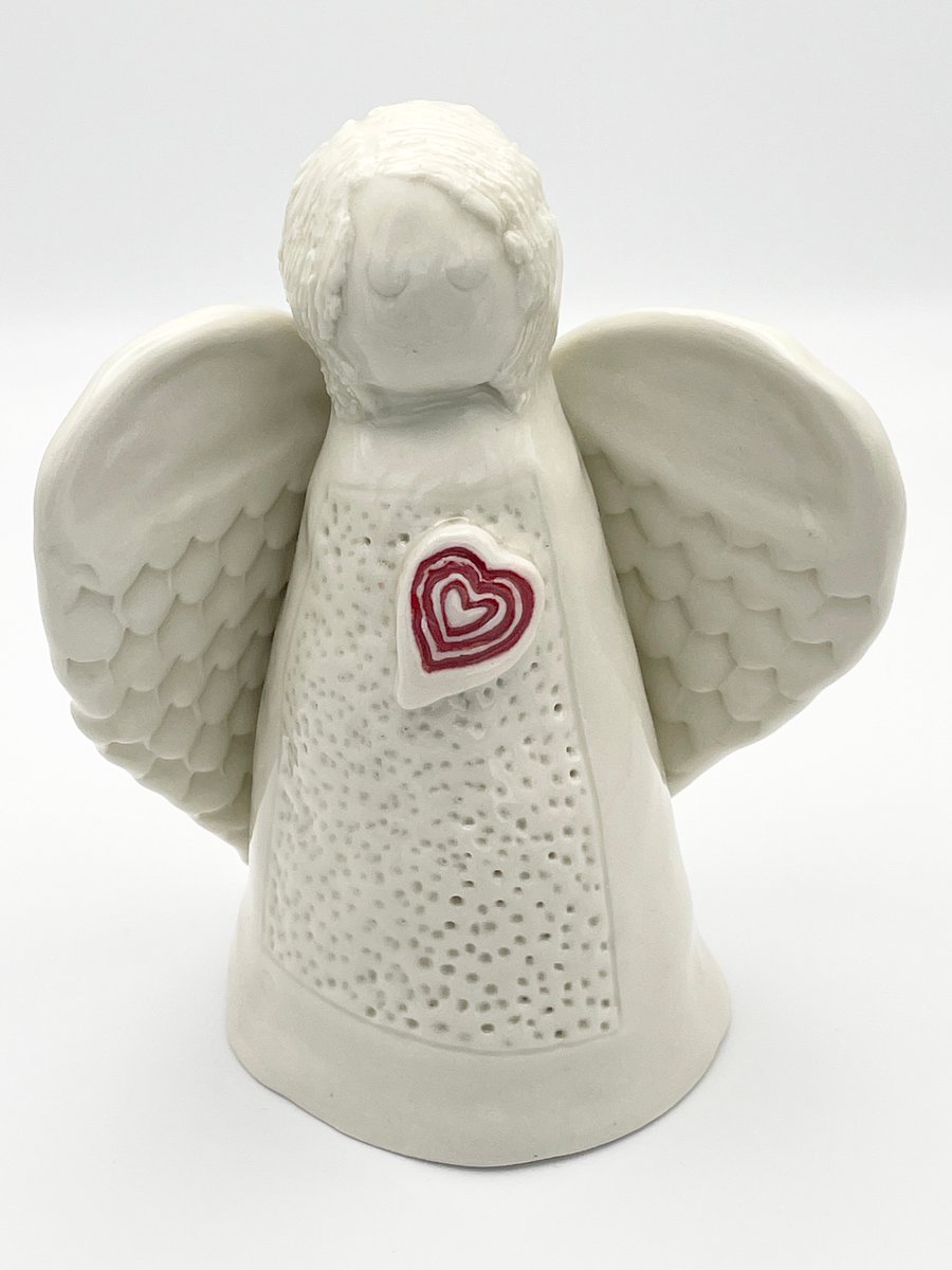 Porcelain Angel sculpture with red heart