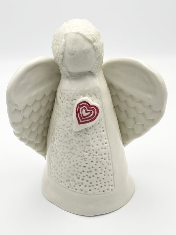 Porcelain Angel sculpture with red heart