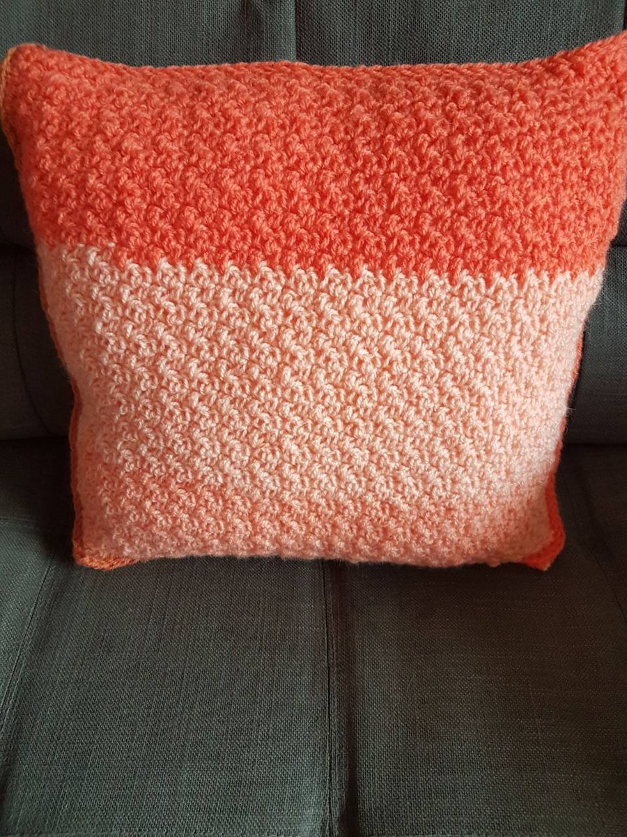 Shades of orange and pink scatter cushion