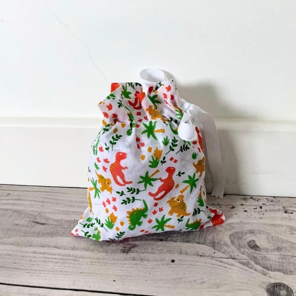 White Dinosaur Fabric Drawstring Gift Bag: Reusable XS Present Wrap.