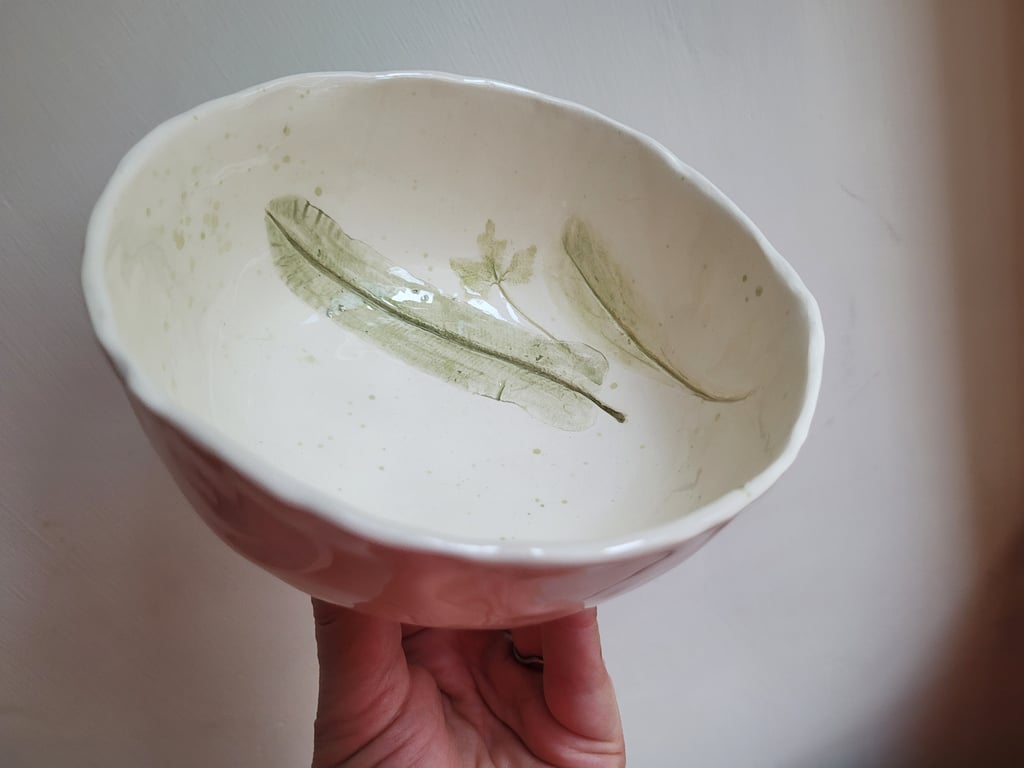 Ceramic bowl with green leaf design hand made botanical splatter pattern. 
