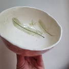 Ceramic bowl with green leaf design hand made botanical splatter pattern. 