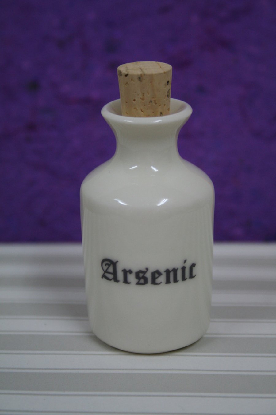 Small porcelain bottle with arsenic wording