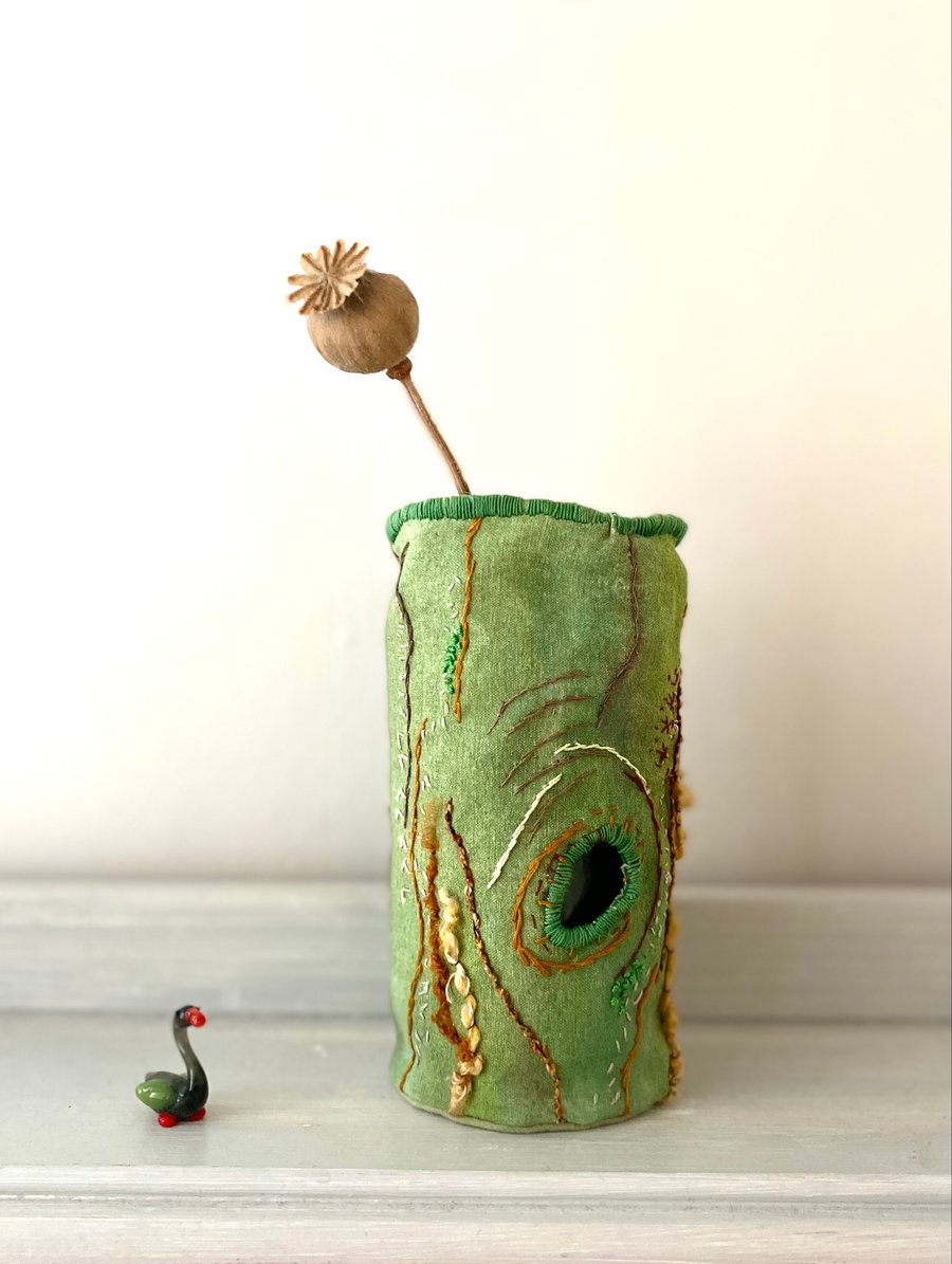 Hand embroidered textile vessel