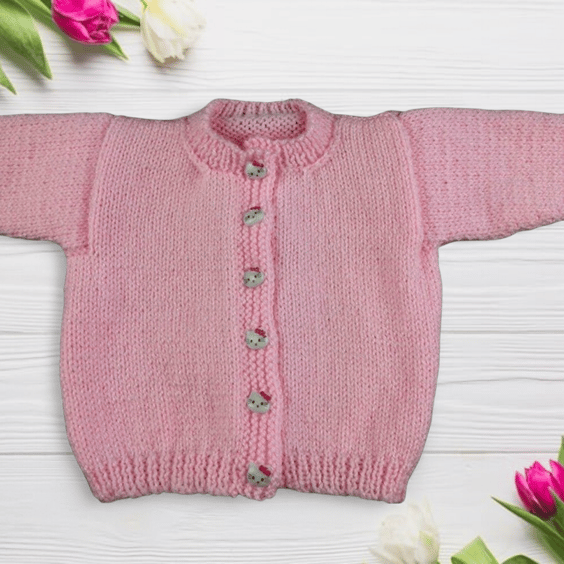 Baby girl cardigan hand knitted in pale pink 0 - 3 months 