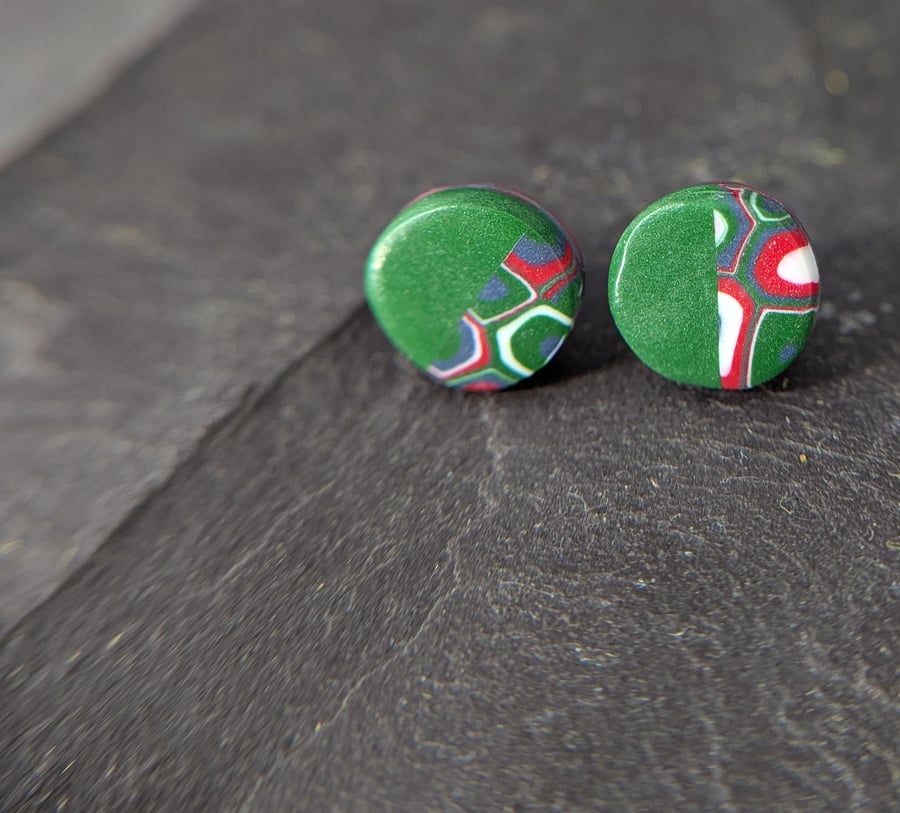 Green with red stud earrings 