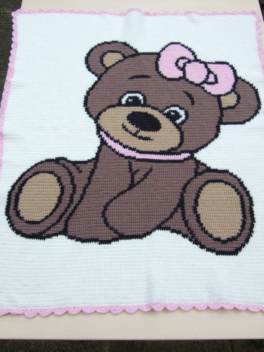 Hand crochet baby blanket or afghan with cute girl teddy bear cot cover throw