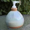 Hand thrown stoneware soap dispenser with pump. Blue green glaze 
