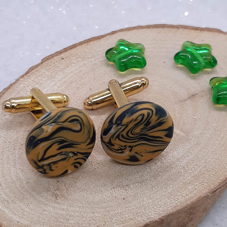 Mustard and black cufflinks