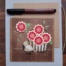 Handmade card, keepsake with a basket of red and yellow flowers and songbird