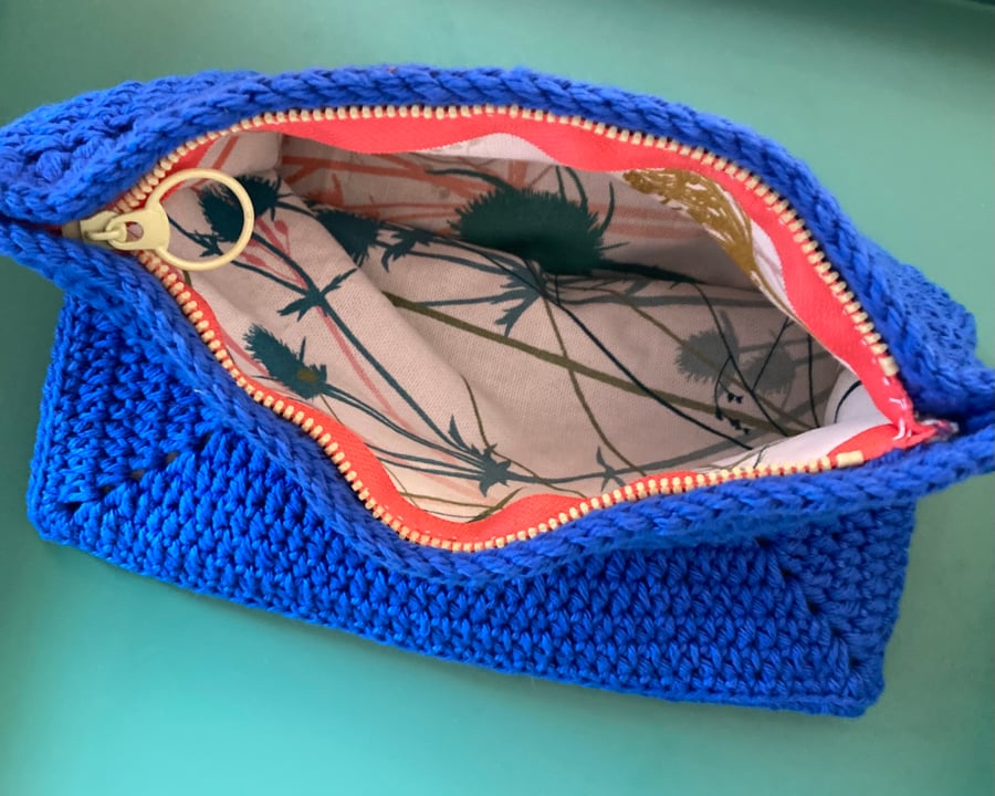 Blue crochet pouch with zip and lining