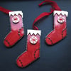 Red ceramic Christmas stocking decoration