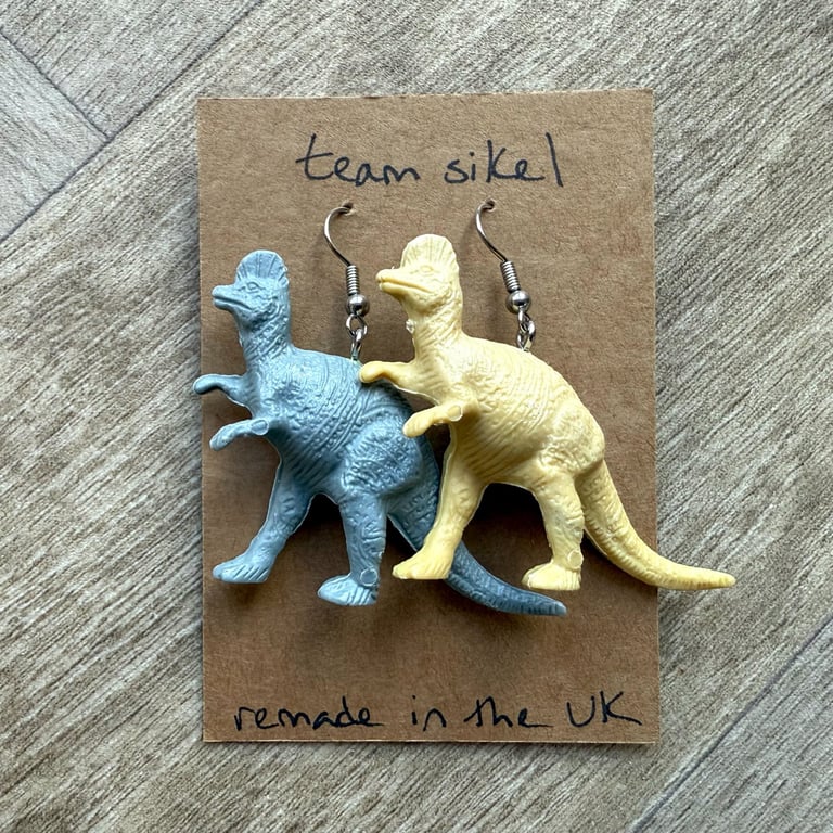 Upcycled Pastel Grey and Yellow Oviraptor Dinosaur Earrings