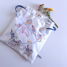 Drawstring bag recycled vintage embroidery with a girl in a romantic crinoline