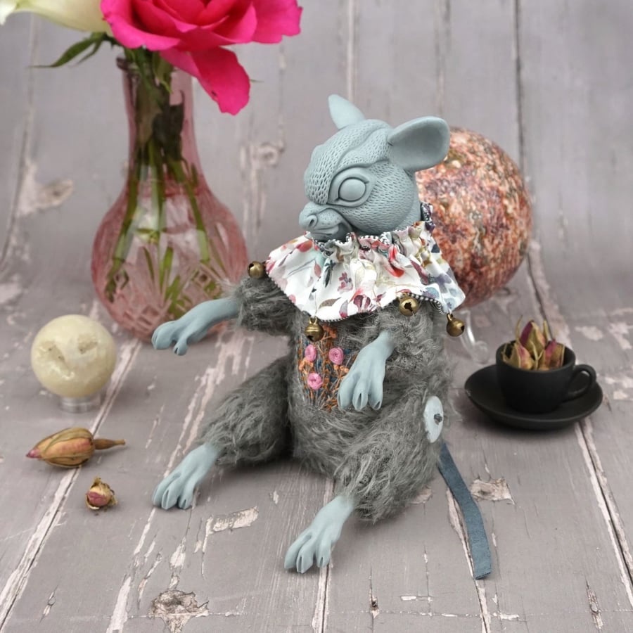 'Marcel', a porcelain and textile mouse doll.