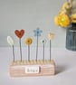 Clay and Button Flower Garden in a Wood Block 'Home'