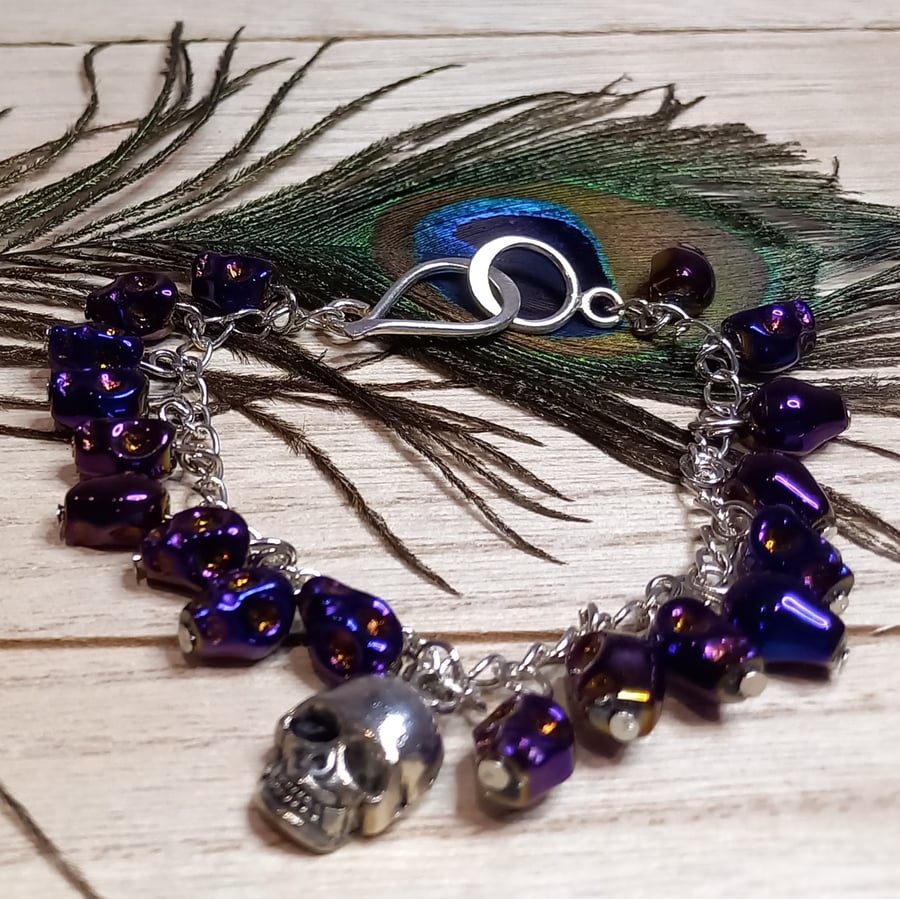 Pirate inspired bracelet with glass skull beads and skull charm