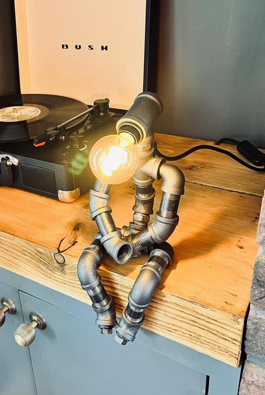 The Pensive Man Industrial Iron Pipe Lamp