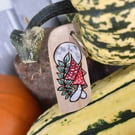 Red Mushrooms under a Full Moon. Pyrography keyring.