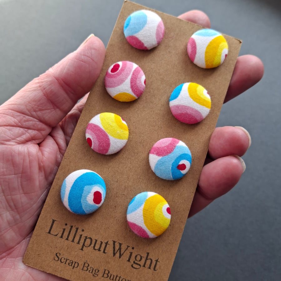 Set of eight scrap bag buttons - pink, blue and yellow