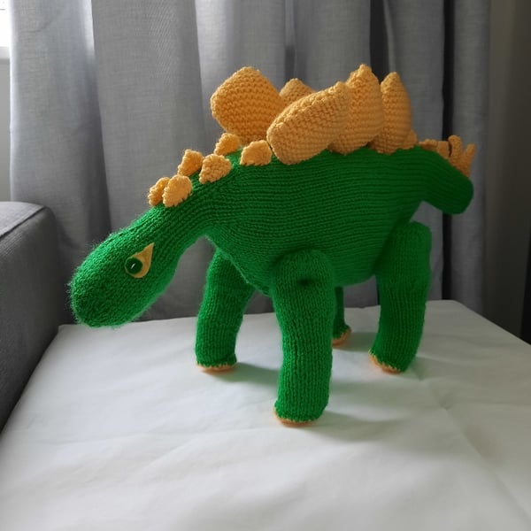 Hand knitted Steggy the Dinosaur toy