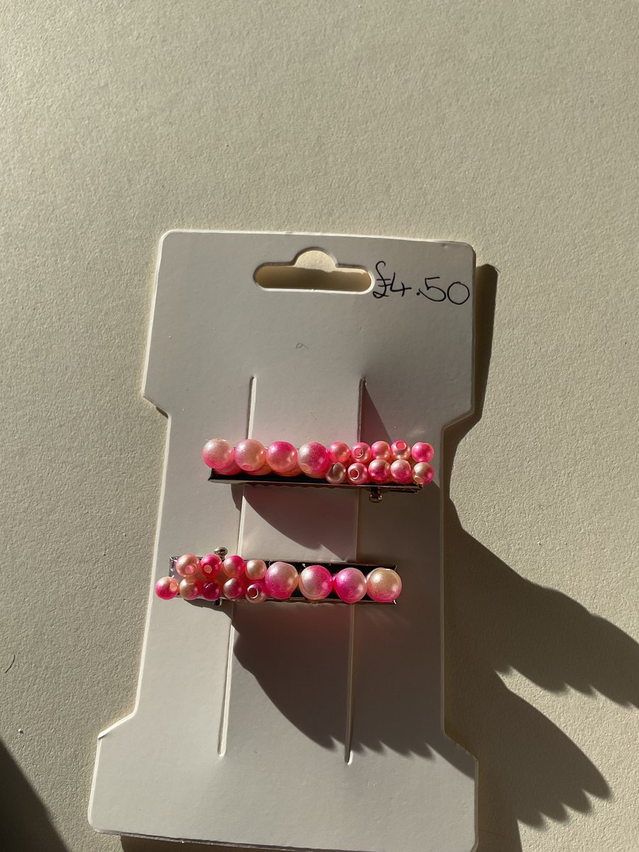 Big and small pink pearl hair clips