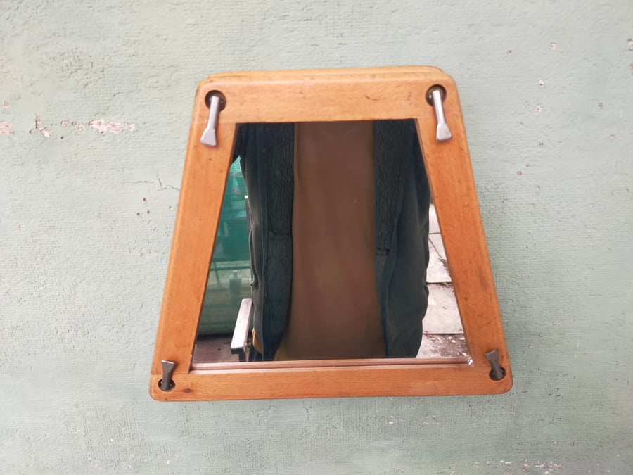 Unusual tennis press mirror