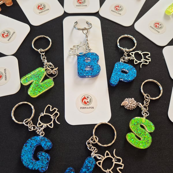 GLITTERY INITIAL KEYRINGS WITH CHARM