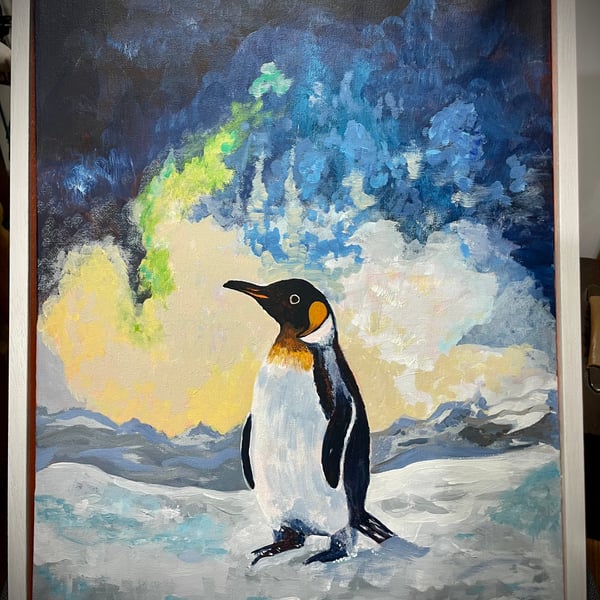 “The Silent Sentinel” - A lone penguin stands watch over the frozen landscape 
