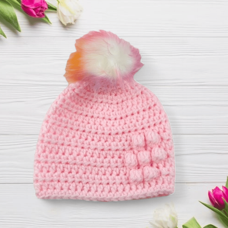 Pink baby crocheted hat white faux fur pompom with orange purple & pink 