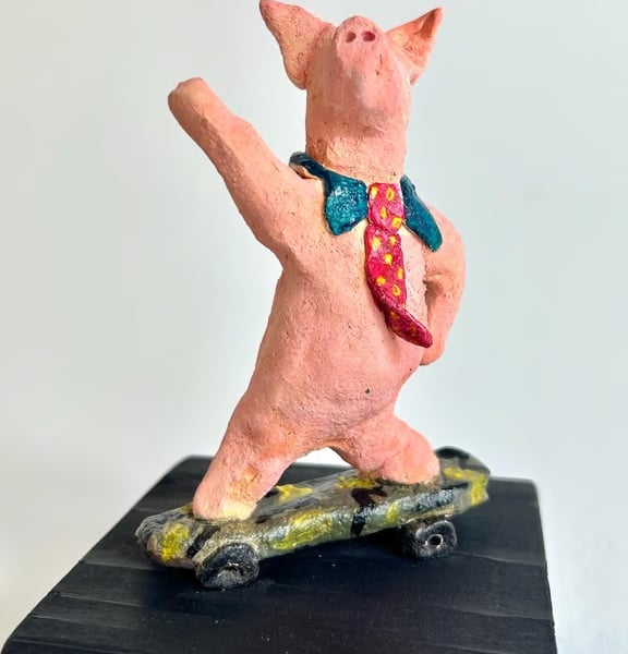 Hand-Built Ceramic Skateboard Pig Sculpture on Wood Block