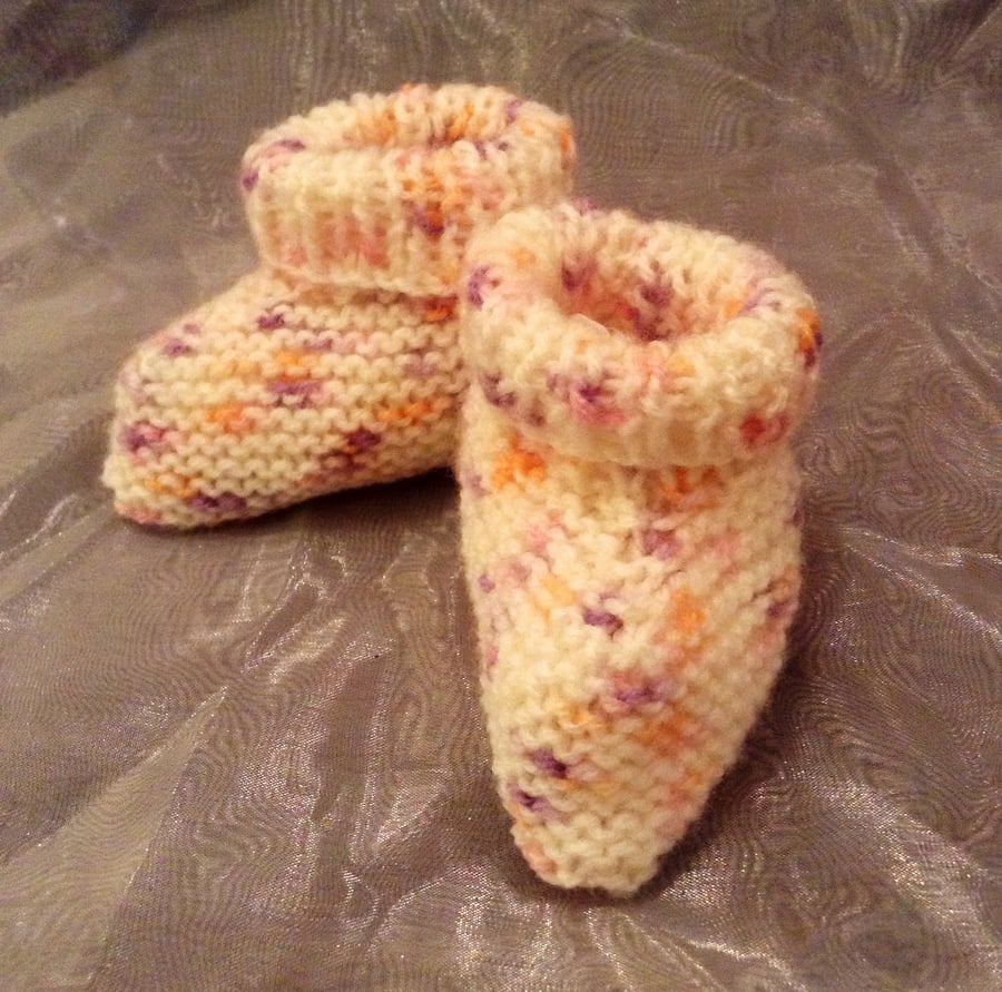 Spotty knitted baby booties
