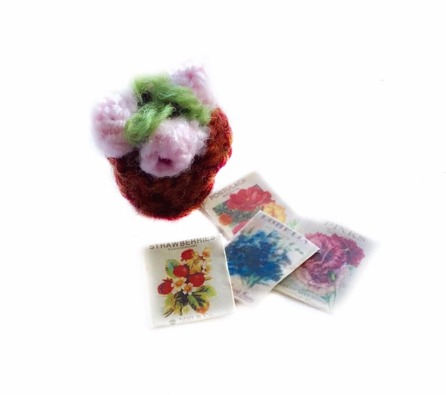  Knitted pink plant and seed packets