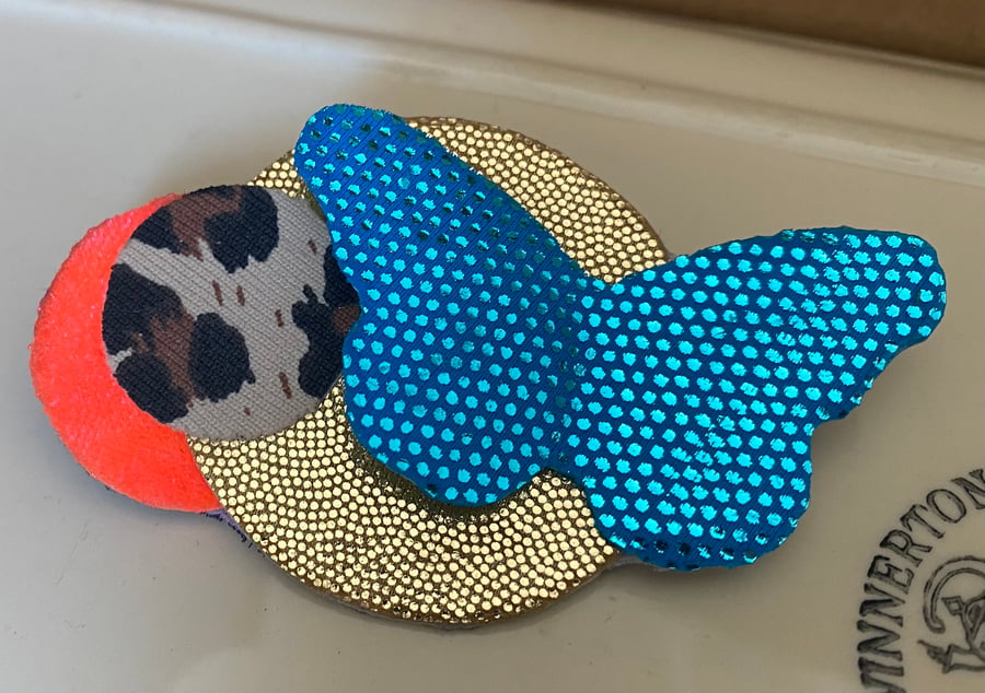 Circles and butterfly fabric brooch inspired by Scottish wildlife 