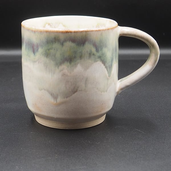 Large stoneware pottery mug finished in grey, brown, cream, white glaze.