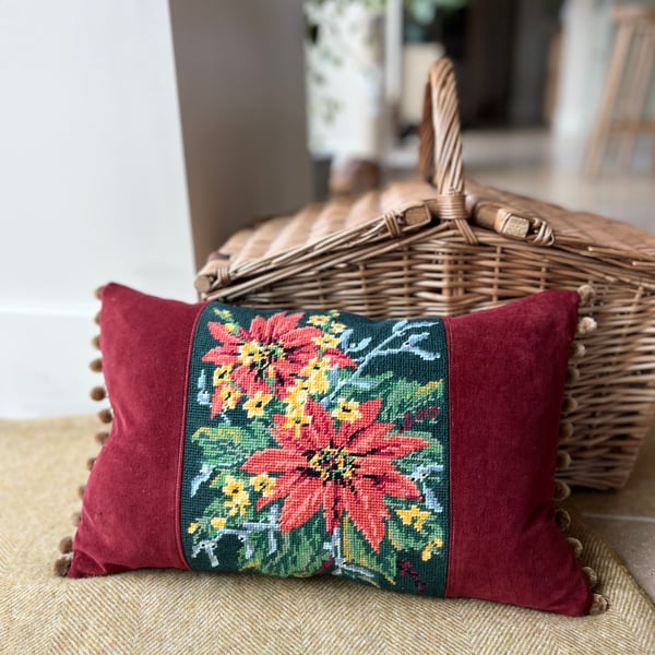 Orange and yellow floral tapestry cushion with pompoms