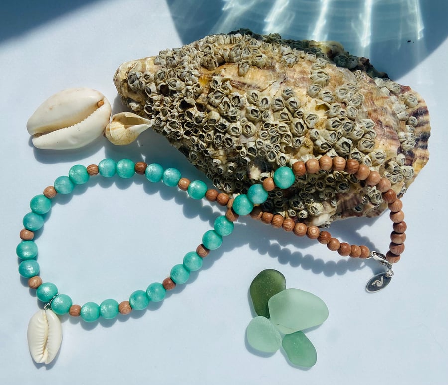 Pale Green Polaris Bead & Cowrie Shell Necklace with Sterling Silver Detail