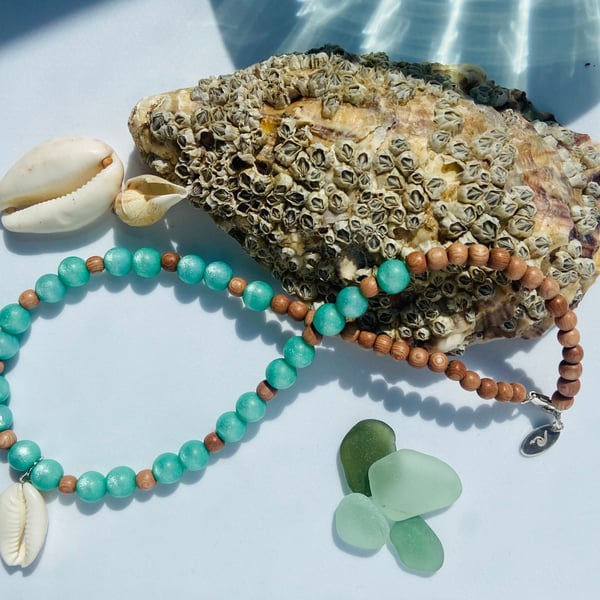 Pale Green Polaris Bead & Cowrie Shell Necklace with Sterling Silver Detail