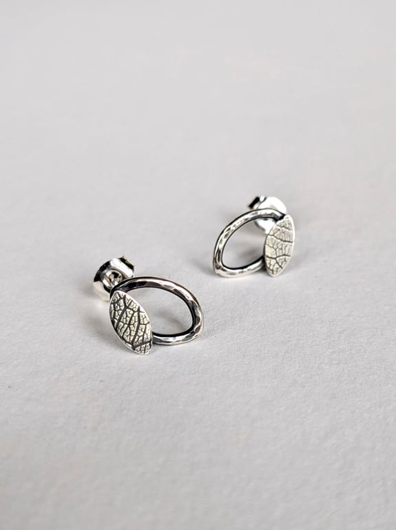 Double leaf sterling silver stud earrings with printed and hammered texture