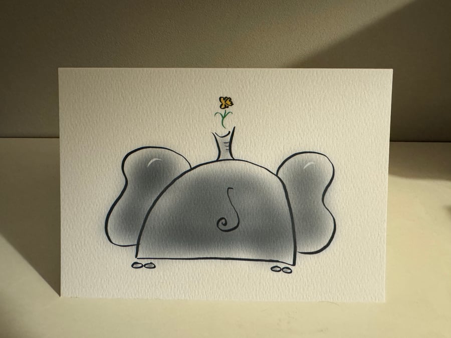Elephant with Daffodil March Birthday Card