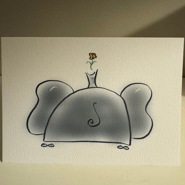 Elephant with Daffodil March Birthday Card