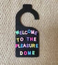 Funny WELCOME TO THE PLEASUREDOME wooden door sign - Image 1