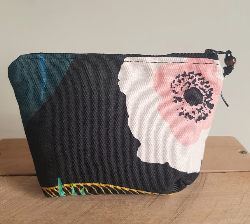 Zipped pouch:  contemporary floral design on black