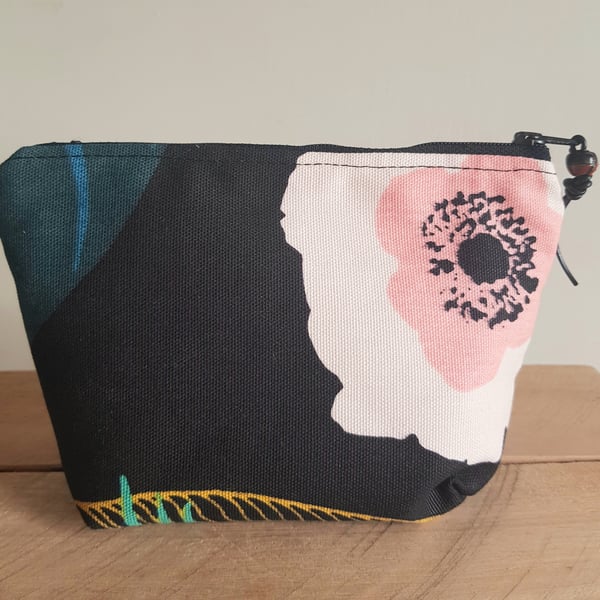 Zipped pouch:  contemporary floral design on black