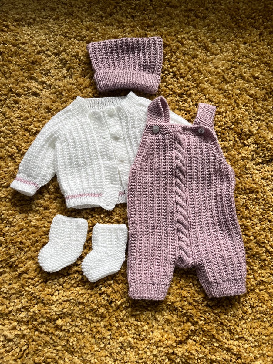 Hand knitted baby outfit 