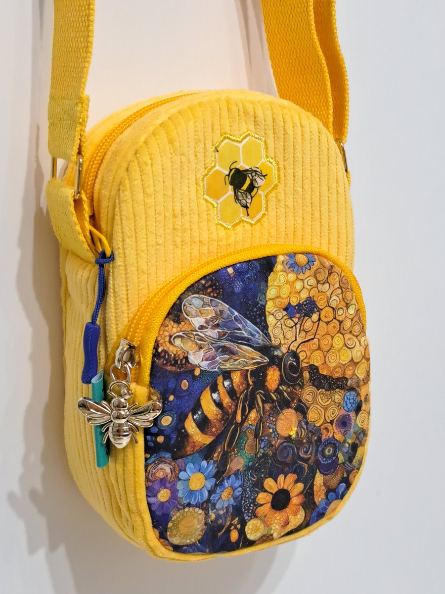 Yellow corduroy phone pouch with bees