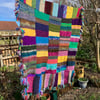 Funky hand knitted cosy blanket 