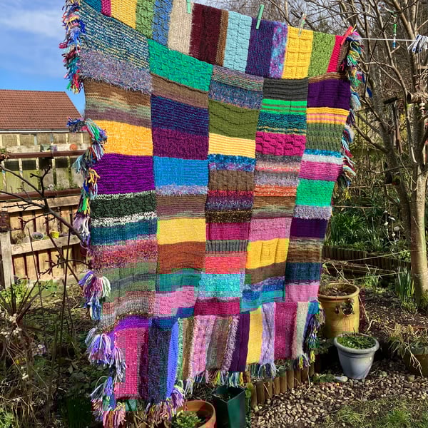 Funky hand knitted cosy blanket 